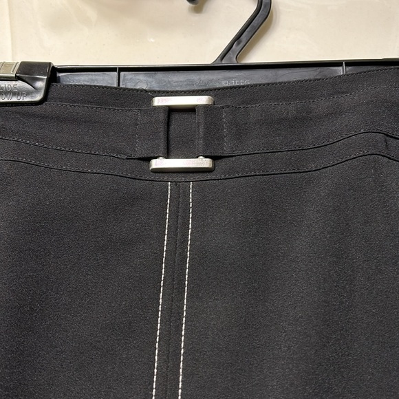 Black skirt with little buckle detail in front and white stitching. - Picture 3 of 5